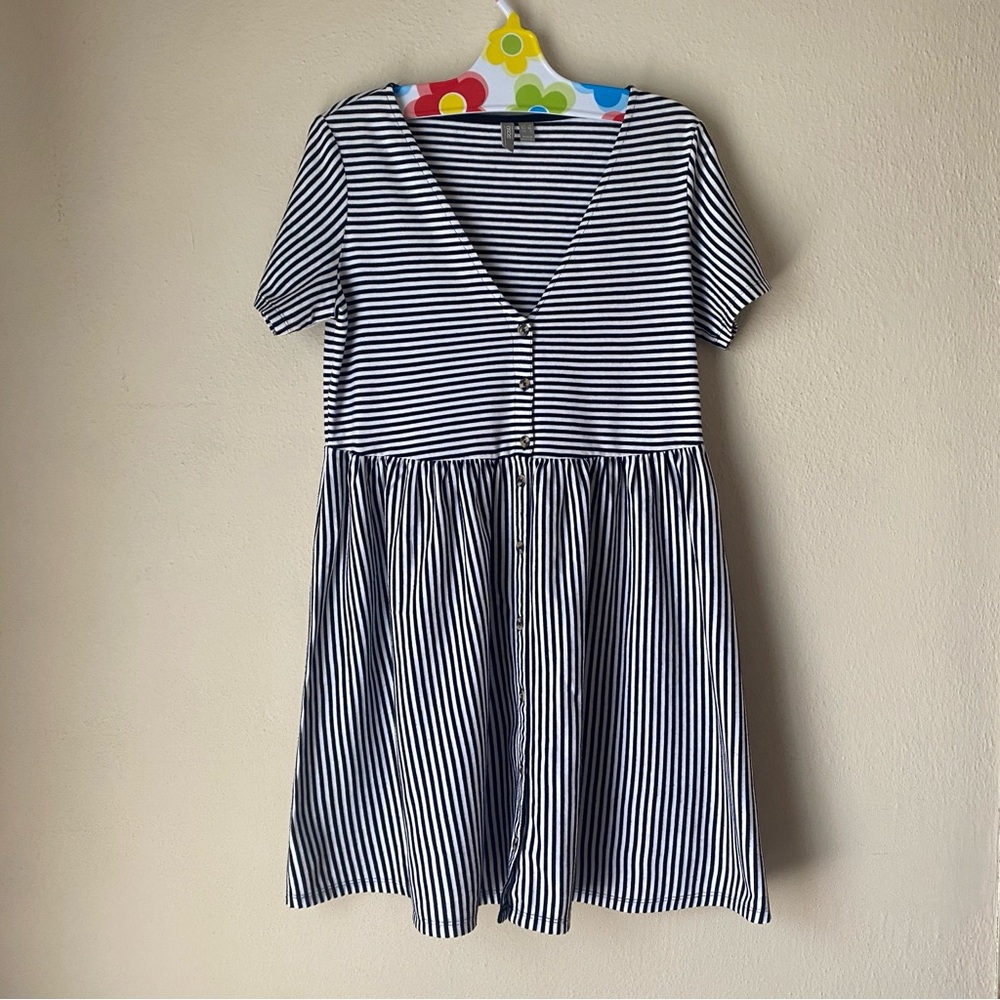 ASOS black and white striped babydoll dress with button-up front.